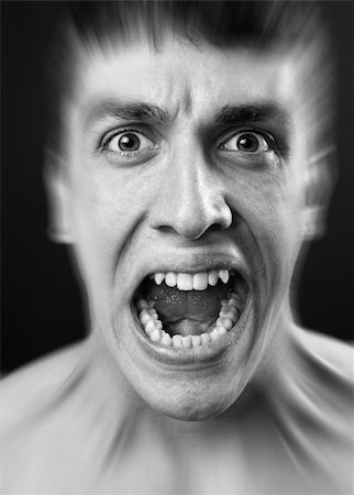 dundanim (artist) - Loud scream of scared frighten young man Fotografie stock - Microstock e Abbonamento, Codice: 400-05195501