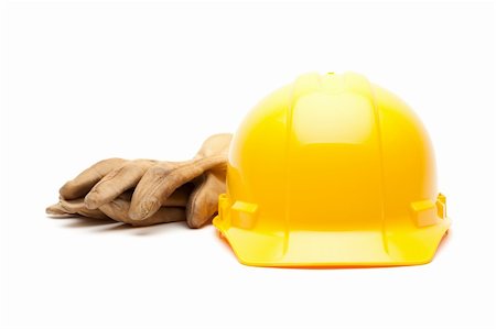 Yellow Hard Hat and Gloves Isolated on White. Stock Photo - Budget Royalty-Free & Subscription, Code: 400-05195811