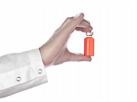 simsearch:400-07976801,k - A doctor holds a vial full of red liquid with his latex gloves on. Isolated on white. Foto de stock - Super Valor sin royalties y Suscripción, Código: 400-05196074