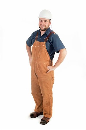 a construction worker looking at the camera isolated Stock Photo - Budget Royalty-Free & Subscription, Code: 400-05196617