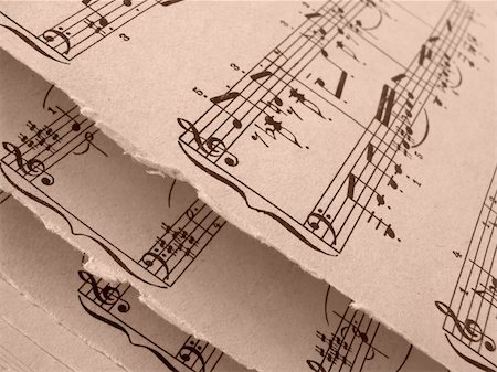 sepia toned open old sheets of musical notes fragment Stock Photo - Budget Royalty-Free & Subscription, Code: 400-05196866