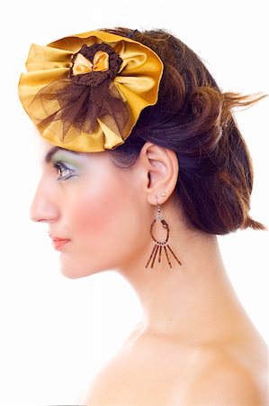 simsearch:400-05197146,k - profile picture of a beautiful woman wearing a yellow brooch and beautiful makeup Stock Photo - Budget Royalty-Free & Subscription, Code: 400-05197146