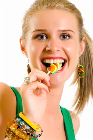 simsearch:400-07568470,k - blond woman licking candy on white background Stockbilder - Microstock & Abonnement, Bildnummer: 400-05197170