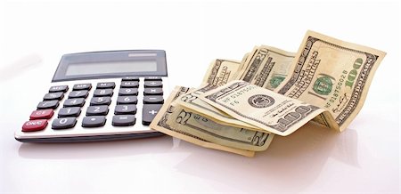 Calculate money with the calculator Photographie de stock - Aubaine LD & Abonnement, Code: 400-05197345