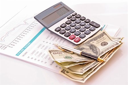 Calculate money with the calculator Photographie de stock - Aubaine LD & Abonnement, Code: 400-05197348