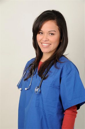 Very happy young Hispanic medical technician starting a new career Stock Photo - Budget Royalty-Free & Subscription, Code: 400-05197485