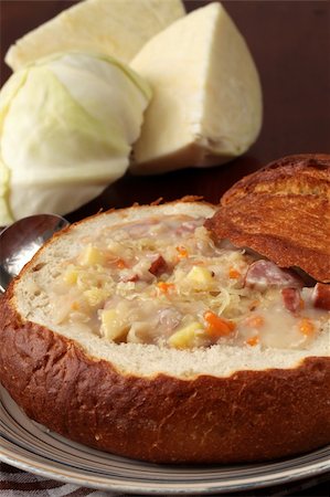 simsearch:400-07301312,k - Traditional Czech cabbage soup made from sauerkraut with potato, carrot and meat sausage, served in a bread bowl Stockbilder - Microstock & Abonnement, Bildnummer: 400-05198269