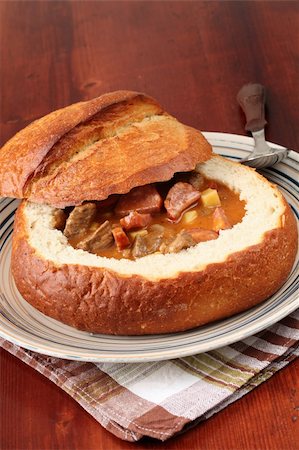 stew sausage - Goulash soup with beef, potato and meat sausage, served in a bread bowl Stock Photo - Budget Royalty-Free & Subscription, Code: 400-05198275