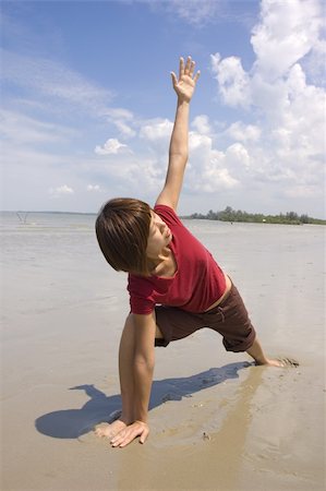 simsearch:400-04596923,k - asian girl performing yoga on a beach Stock Photo - Budget Royalty-Free & Subscription, Code: 400-05198608