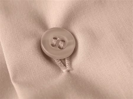 simsearch:400-05303269,k - sepia toned shirt fragment with button closeup Stock Photo - Budget Royalty-Free & Subscription, Code: 400-05190035