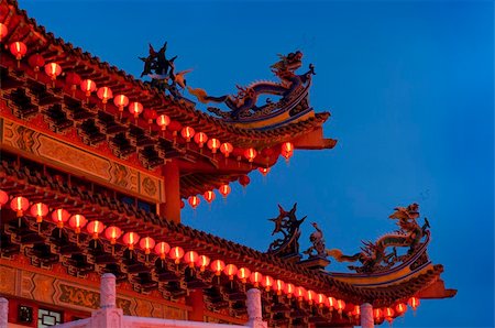 Buddhist Temple with red lantern at dusk. Stock Photo - Budget Royalty-Free & Subscription, Code: 400-05190042