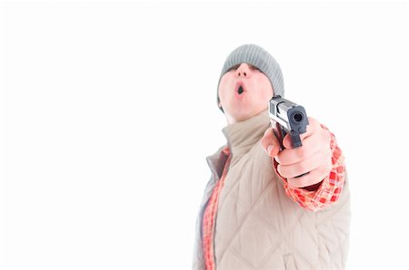 simsearch:400-04577380,k - Young man is aiming with gun. Isolated on white. Fotografie stock - Microstock e Abbonamento, Codice: 400-05190153