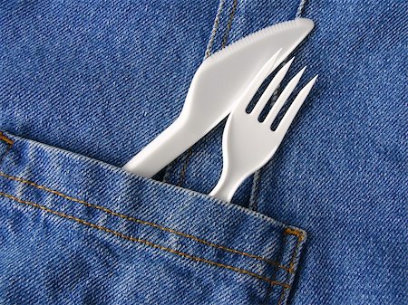 simsearch:400-05303269,k - disposable fork and knife in the denim pocket Stock Photo - Budget Royalty-Free & Subscription, Code: 400-05190278