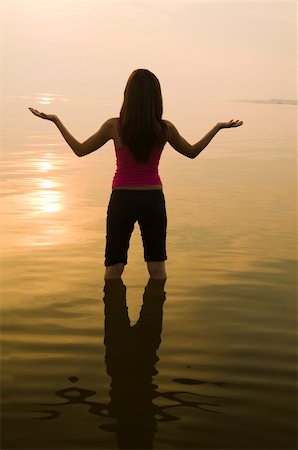 silhouette of an asian girl performing yoga Stock Photo - Budget Royalty-Free & Subscription, Code: 400-05190791