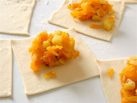 strudel - preparing vegetarian dumplings with pumpkin and potato for steamer Stock Photo - Budget Royalty-Free & Subscription, Code: 400-05190954