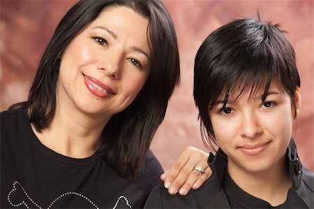 Attractive Multiethnic Mother and Daughter Studio Portrait. Stock Photo - Budget Royalty-Free & Subscription, Code: 400-05191504