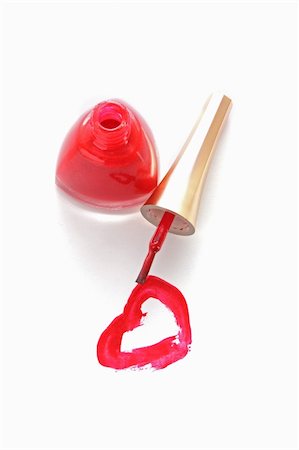 Red  nail polish and heart on white background Stock Photo - Budget Royalty-Free & Subscription, Code: 400-05191633