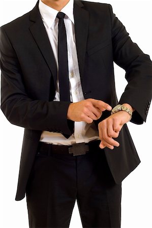 businessman looking and pointing at his watch Stock Photo - Budget Royalty-Free & Subscription, Code: 400-05191985