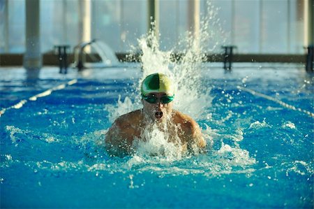 simsearch:400-04731600,k - health and fitness lifestyle concept with young athlete swimmer recreating  on olimpic pool Stock Photo - Budget Royalty-Free & Subscription, Code: 400-05192206