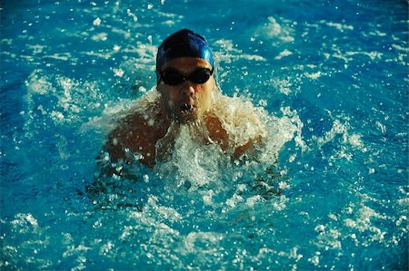 simsearch:400-04731600,k - health and fitness lifestyle concept with young athlete swimmer recreating  on olimpic pool Stock Photo - Budget Royalty-Free & Subscription, Code: 400-05192209