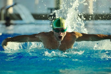 simsearch:400-04731600,k - health and fitness lifestyle concept with young athlete swimmer recreating  on olimpic pool Stock Photo - Budget Royalty-Free & Subscription, Code: 400-05192504