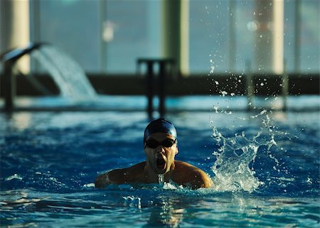 simsearch:400-04731600,k - health and fitness lifestyle concept with young athlete swimmer recreating  on olimpic pool Stock Photo - Budget Royalty-Free & Subscription, Code: 400-05192505