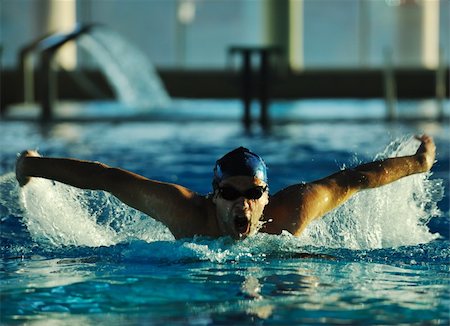 simsearch:400-04731600,k - health and fitness lifestyle concept with young athlete swimmer recreating  on olimpic pool Stock Photo - Budget Royalty-Free & Subscription, Code: 400-05192506