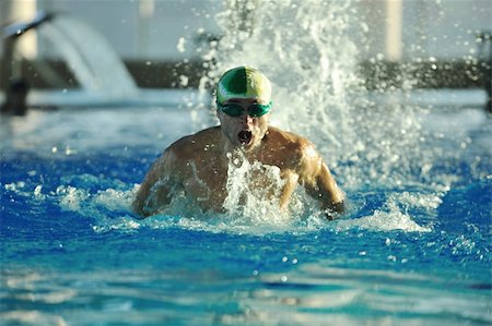 health and fitness lifestyle concept with young athlete swimmer recreating  on olimpic pool Fotografie stock - Microstock e Abbonamento, Codice: 400-05192503