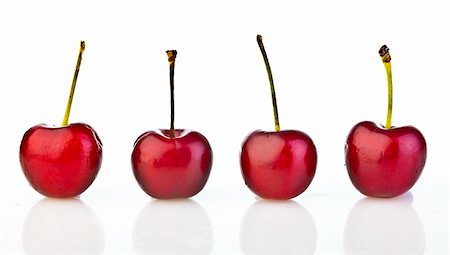 cherries against white background Photographie de stock - Aubaine LD & Abonnement, Code: 400-05192580