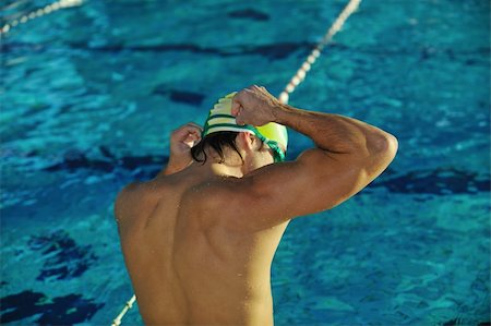 simsearch:400-04731600,k - health and fitness lifestyle concept with young athlete swimmer recreating  on olimpic pool Stock Photo - Budget Royalty-Free & Subscription, Code: 400-05192734