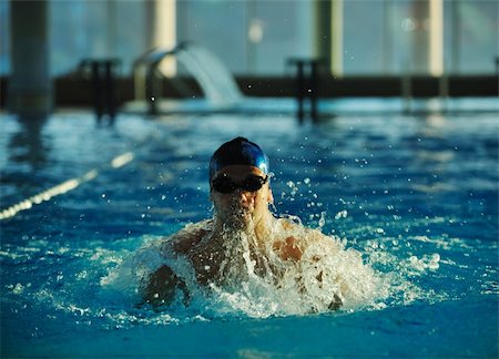 simsearch:400-04731600,k - health and fitness lifestyle concept with young athlete swimmer recreating  on olimpic pool Stock Photo - Budget Royalty-Free & Subscription, Code: 400-05192732