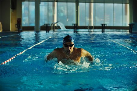simsearch:400-04731600,k - health and fitness lifestyle concept with young athlete swimmer recreating  on olimpic pool Stock Photo - Budget Royalty-Free & Subscription, Code: 400-05192733