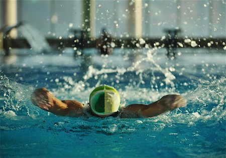 simsearch:400-04731600,k - health and fitness lifestyle concept with young athlete swimmer recreating  on olimpic pool Stock Photo - Budget Royalty-Free & Subscription, Code: 400-05192757