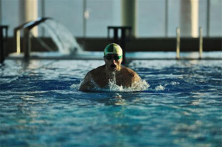 simsearch:400-04731600,k - health and fitness lifestyle concept with young athlete swimmer recreating  on olimpic pool Stock Photo - Budget Royalty-Free & Subscription, Code: 400-05192764