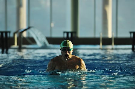 simsearch:400-04731600,k - health and fitness lifestyle concept with young athlete swimmer recreating  on olimpic pool Stock Photo - Budget Royalty-Free & Subscription, Code: 400-05192765