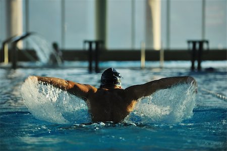 simsearch:400-04731600,k - health and fitness lifestyle concept with young athlete swimmer recreating  on olimpic pool Stock Photo - Budget Royalty-Free & Subscription, Code: 400-05192768