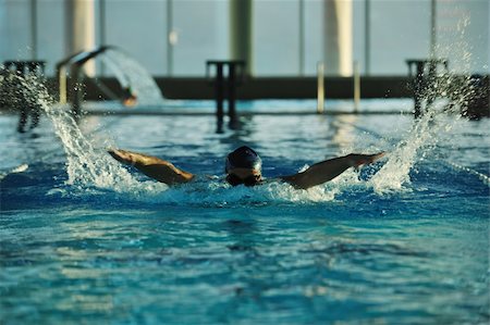 simsearch:400-04731600,k - health and fitness lifestyle concept with young athlete swimmer recreating  on olimpic pool Stock Photo - Budget Royalty-Free & Subscription, Code: 400-05192786