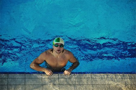 simsearch:400-04731600,k - health and fitness lifestyle concept with young athlete swimmer recreating  on olimpic pool Stock Photo - Budget Royalty-Free & Subscription, Code: 400-05192794