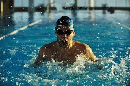simsearch:400-04731600,k - health and fitness lifestyle concept with young athlete swimmer recreating  on olimpic pool Stock Photo - Budget Royalty-Free & Subscription, Code: 400-05192790