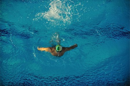 simsearch:400-04731600,k - health and fitness lifestyle concept with young athlete swimmer recreating  on olimpic pool Stock Photo - Budget Royalty-Free & Subscription, Code: 400-05192792