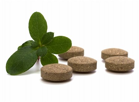 echinacea - herbal pills isolated on white background Fotografie stock - Microstock e Abbonamento, Codice: 400-05193423