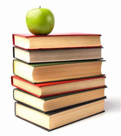 book stack with apple isolated on white background Stock Photo - Budget Royalty-Free & Subscription, Code: 400-05193455