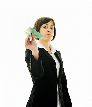 happy young business woman isolated ona white throwing paper airplane Stock Photo - Budget Royalty-Free & Subscription, Code: 400-05204430