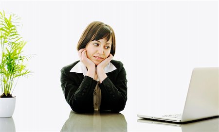 simsearch:400-05209692,k - one young business woman isolated on white working on laptop computer Stock Photo - Budget Royalty-Free & Subscription, Code: 400-05204468