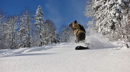 simsearch:400-05204614,k - freestyle snowboarder jump and ride free style  at sunny winter day on mountain Stock Photo - Budget Royalty-Free & Subscription, Code: 400-05204534