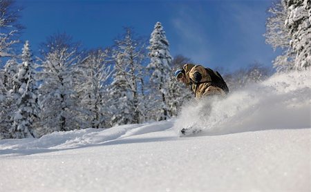 simsearch:400-05204614,k - freestyle snowboarder jump and ride free style  at sunny winter day on mountain Stock Photo - Budget Royalty-Free & Subscription, Code: 400-05204535
