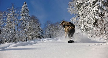 simsearch:400-05204614,k - freestyle snowboarder jump and ride free style  at sunny winter day on mountain Stock Photo - Budget Royalty-Free & Subscription, Code: 400-05204533