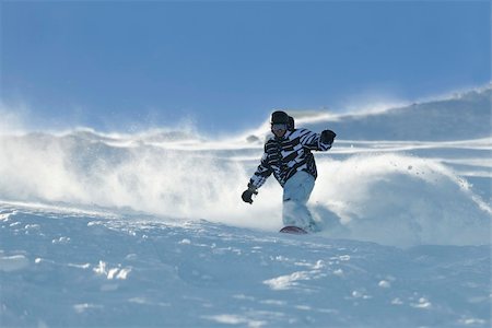 simsearch:400-05204614,k - freestyle snowboarder jump and ride free style  at sunny winter day on mountain Stock Photo - Budget Royalty-Free & Subscription, Code: 400-05204541