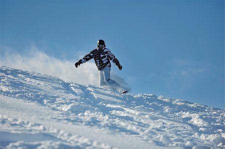 simsearch:400-04013574,k - freestyle snowboarder jump and ride free style  at sunny winter day on mountain Stock Photo - Budget Royalty-Free & Subscription, Code: 400-05204554