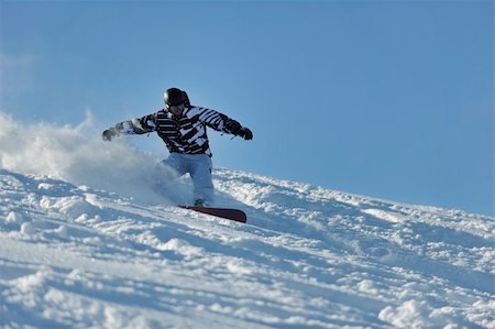 simsearch:400-05204614,k - freestyle snowboarder jump and ride free style  at sunny winter day on mountain Stock Photo - Budget Royalty-Free & Subscription, Code: 400-05204557